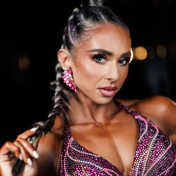 Maria Kudaeva Iron Mother official portrait, muscular and feminine bodyfitness athlete